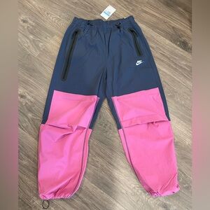 Nike oversized fit pink and navy woven track pants